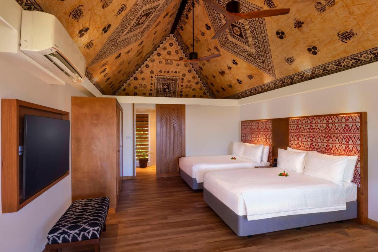 アウトリガー フィジー ビーチ リゾート コロトゴ エクステリア 写真 A bedroom at the Sheraton Resort Fiji